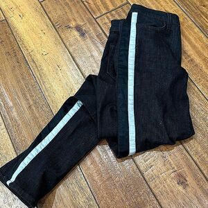 black skinny jeans with white and black satin stripes on side